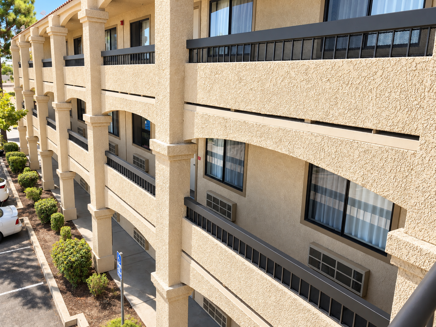 Commercial exterior railings across multi-story hotel balconies