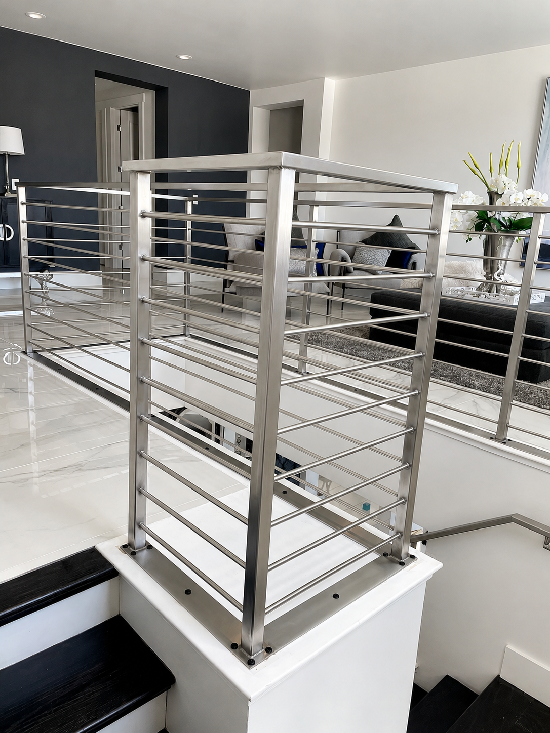Stainless steel railing detail at stair landing