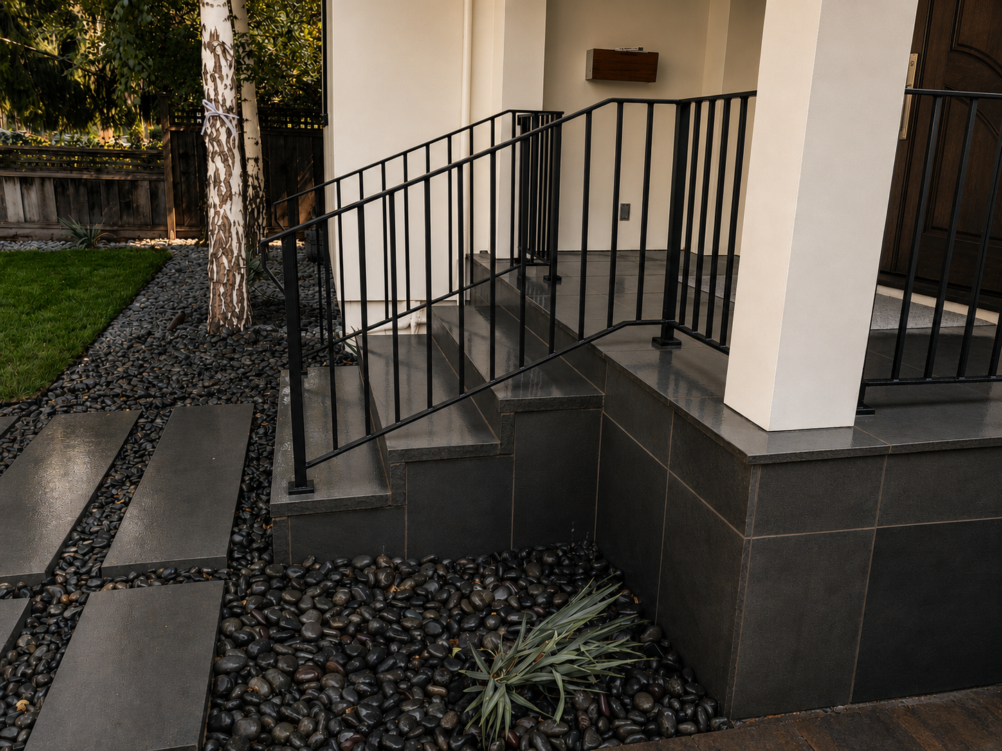 Side view of black entry stair railing