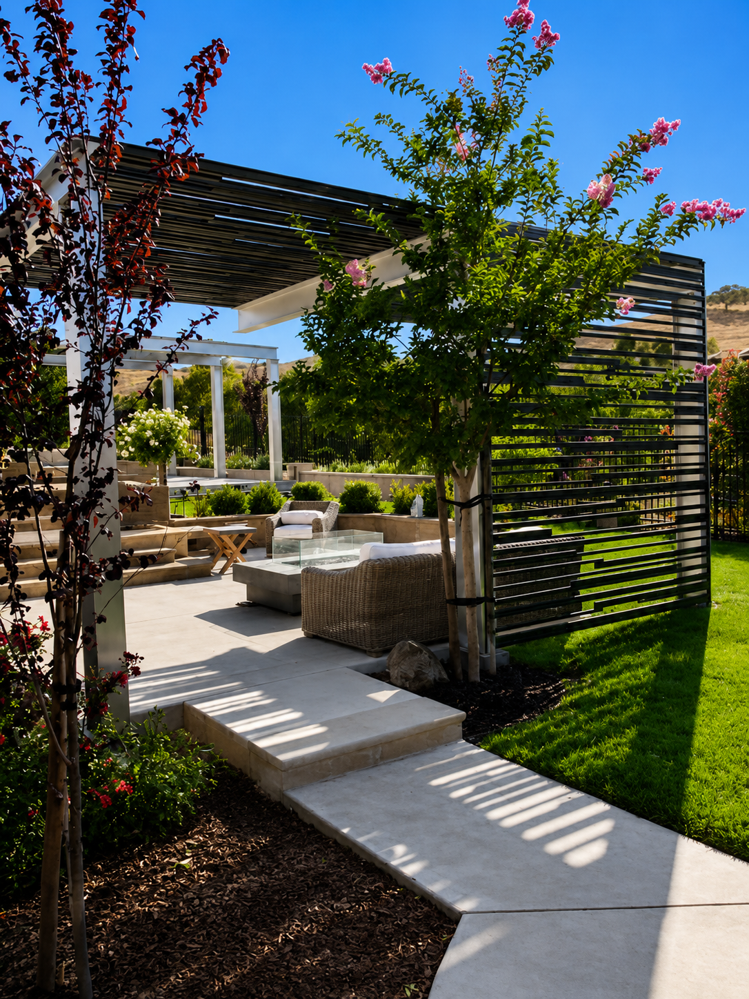 Garden path leading to aluminum trellis patio cover
